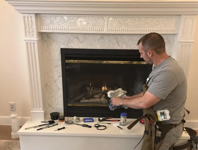 Bonita Springs Chimney Sweep performing fireplace maintenance in Bonita Springs, FL